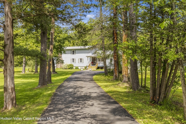 2410 Bruynswick Rd, Wallkill, NY 12589 - view of front of house with a front lawn and driveway