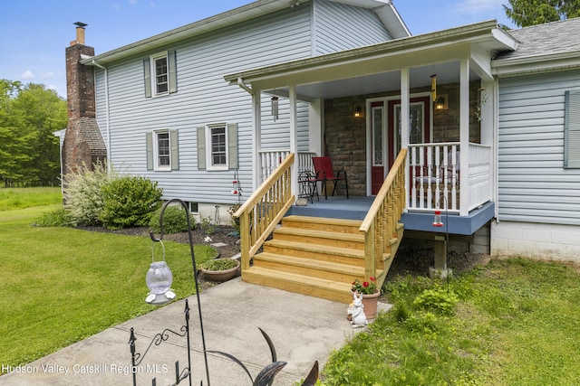 2410 Bruynswick Rd, Wallkill, NY 12589 - view of front of property with covered porch, a front lawn, and a chimney