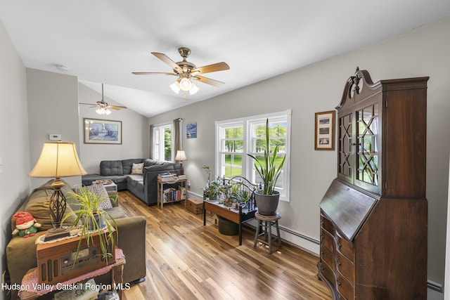 2410 Bruynswick Rd, Wallkill, NY 12589 - living area featuring wood finished floors, lofted ceiling, a ceiling fan, and baseboards