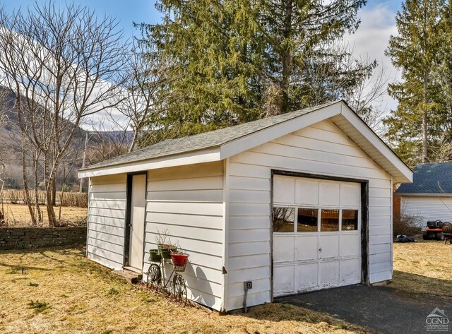 51 Division St, Hunter, NY 12442 - detached garage featuring driveway