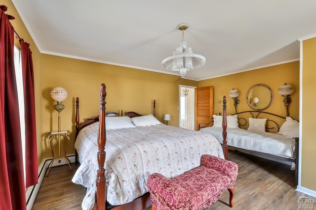 51 Division St, Hunter, NY 12442 - bedroom with wood finished floors, a baseboard radiator, a chandelier, ornamental molding, and baseboards