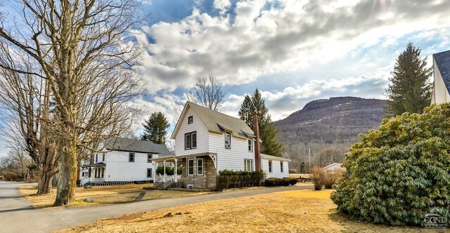 51 Division St, Hunter, NY 12442 - view of side of home with a mountain view