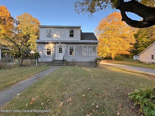 view of front of home with a front lawn