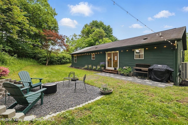 200 Wilbur Ave, Kingston, NY 12401 - rear view of house with a fire pit, a patio area, a lawn, and entry steps