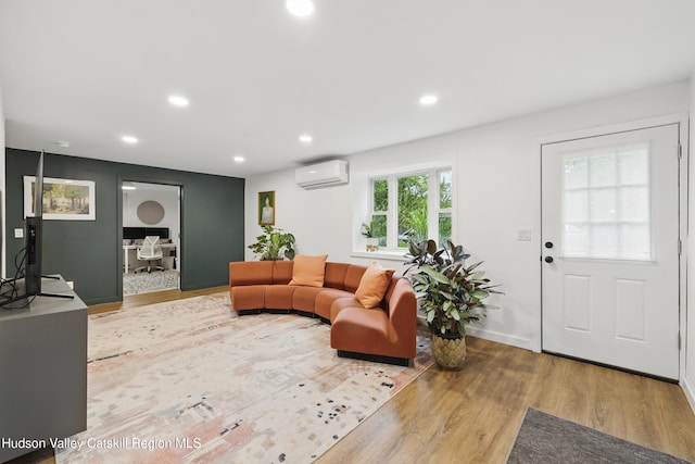 200 Wilbur Ave, Kingston, NY 12401 - living area with an AC wall unit, wood finished floors, and recessed lighting