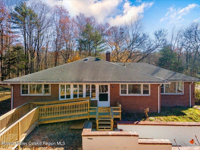 view of front of property featuring a deck