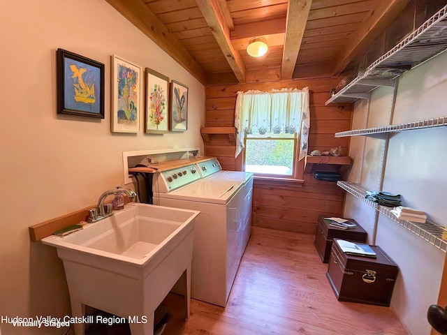 422 Waterview Dr, Andes, NY 13731 - laundry area with wooden ceiling, washing machine and clothes dryer, light wood finished floors, and wood walls