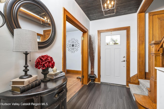 71 Melrose Ave, Albany, NY 12203 - foyer entrance with dark wood-style flooring, stairway, and baseboards