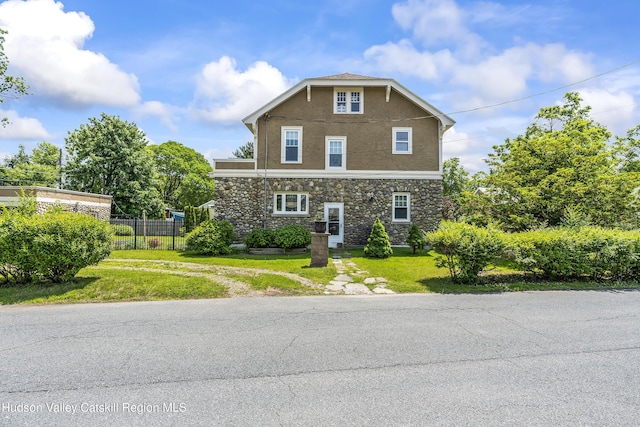 71 Melrose Ave, Albany, NY 12203 - view of side of home featuring stone siding, stucco siding, and dirt driveway
