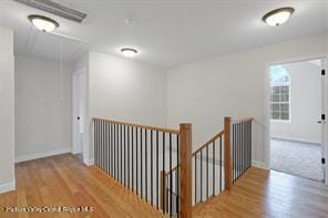 hall featuring light hardwood / wood-style flooring