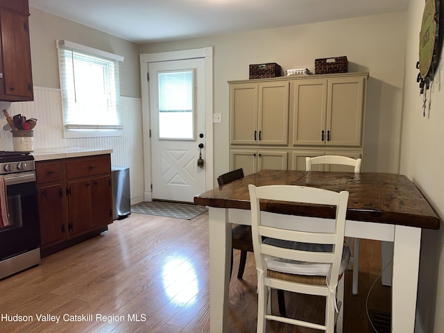 14 Brown Rd, Copake, NY 12516 - dining space featuring light wood-type flooring and a wainscoted wall