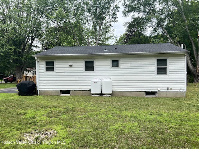 14 Brown Rd, Copake, NY 12516 - rear view of house featuring a yard and roof with shingles