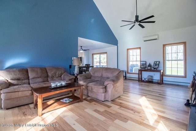 living room featuring a wall mounted AC, ceiling fan, high vaulted ceiling, and light hardwood / wood-style floors