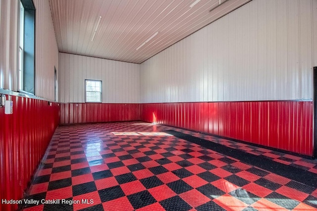 empty room with wood walls