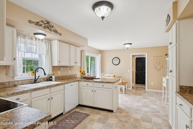 20 Cedar Ridge Rd, Stone Ridge, NY 12484 - kitchen featuring white dishwasher, a peninsula, and white cabinets