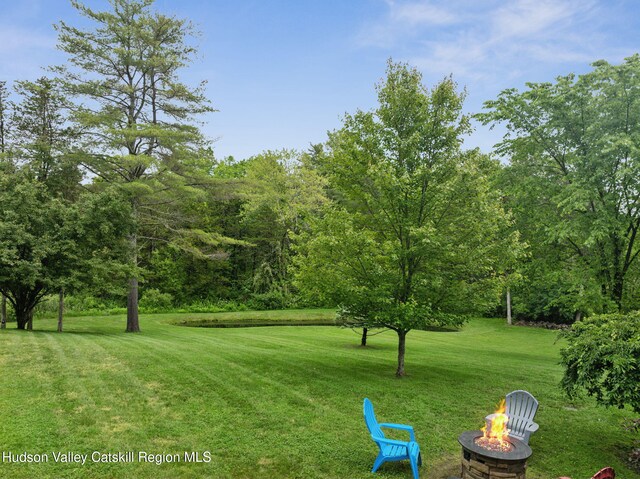 20 Cedar Ridge Rd, Stone Ridge, NY 12484 - view of grassy yard featuring a fire pit