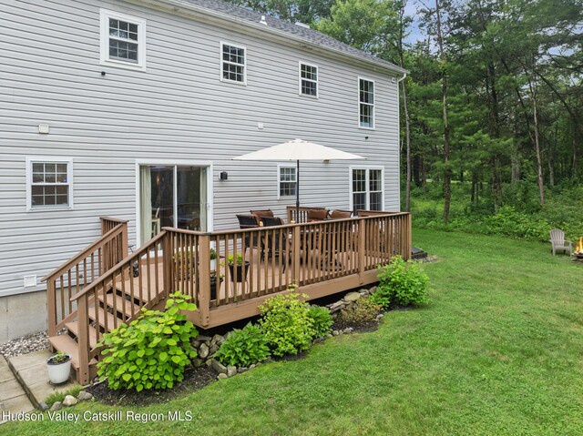 20 Cedar Ridge Rd, Stone Ridge, NY 12484 - rear view of property with a deck, a lawn, and a shingled roof