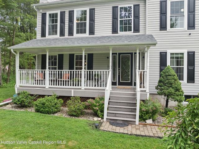 20 Cedar Ridge Rd, Stone Ridge, NY 12484 - view of front of property with covered porch and a front yard