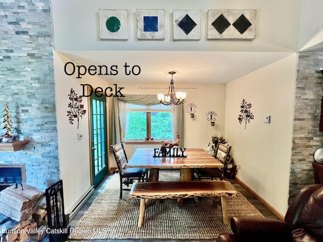 82 Liftside Dr Unit A13, Hunter, NY 12442 - dining room with a chandelier and baseboards