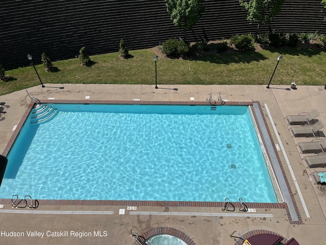 82 Liftside Dr Unit A13, Hunter, NY 12442 - community pool with a lawn