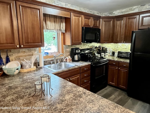82 Liftside Dr Unit A13, Hunter, NY 12442 - kitchen with black appliances, a sink, backsplash, and dark wood-style floors