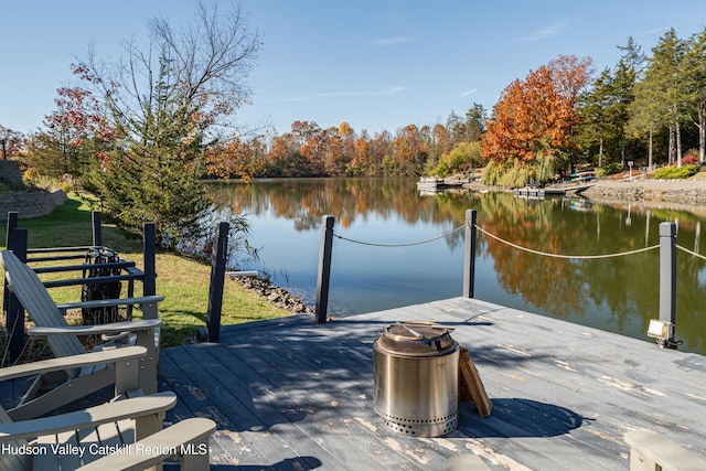 view of dock with a water view