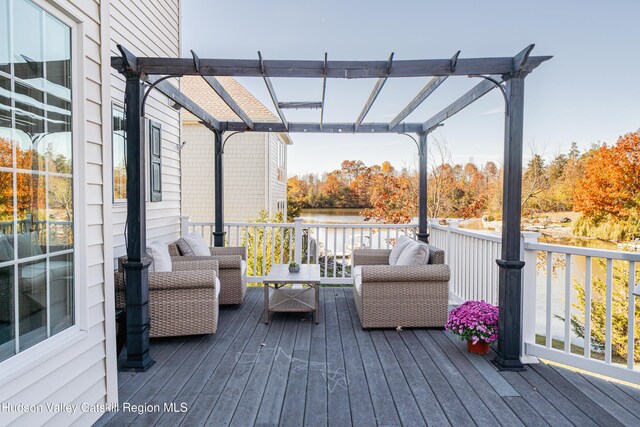 wooden deck featuring a pergola