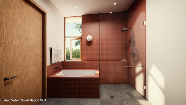 bathroom with shower with separate bathtub