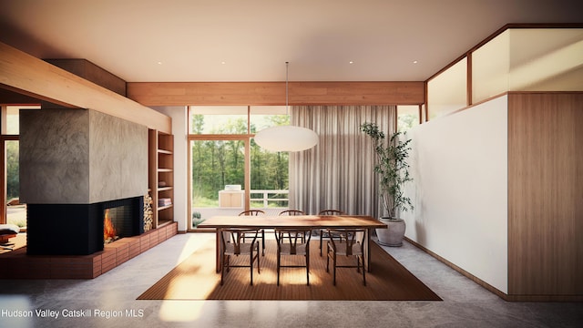 dining room featuring a multi sided fireplace