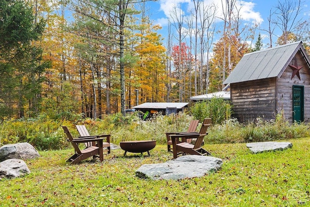 214 Fog Hill Rd, Austerlitz, NY 12017 - view of yard with an outbuilding and an outdoor fire pit