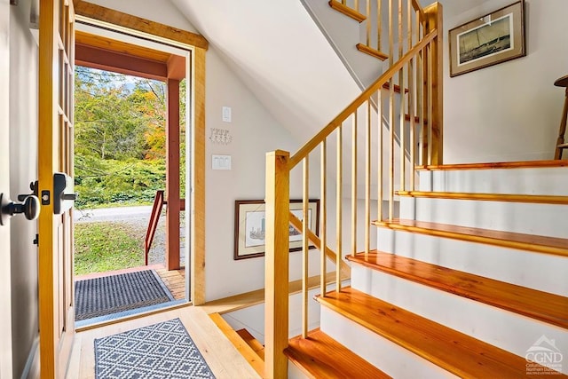 214 Fog Hill Rd, Austerlitz, NY 12017 - foyer entrance with stairway, vaulted ceiling, and wood finished floors