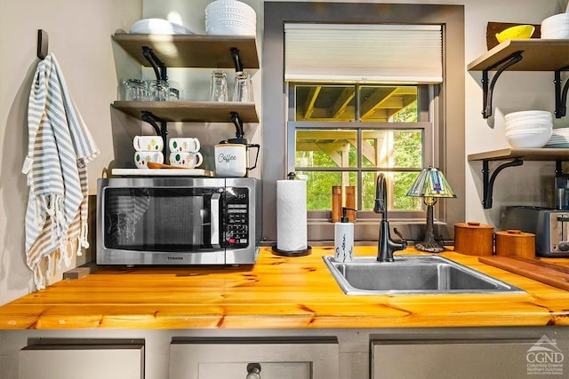 214 Fog Hill Rd, Austerlitz, NY 12017 - bar area featuring stainless steel microwave and a sink