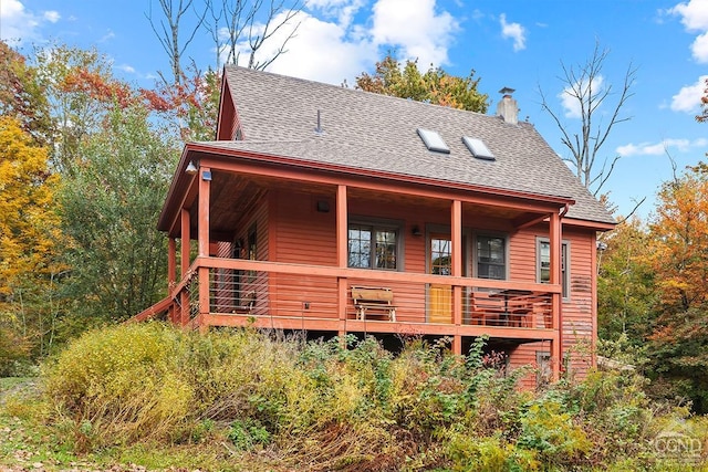 214 Fog Hill Rd, Austerlitz, NY 12017 - back of property featuring roof with shingles and a chimney