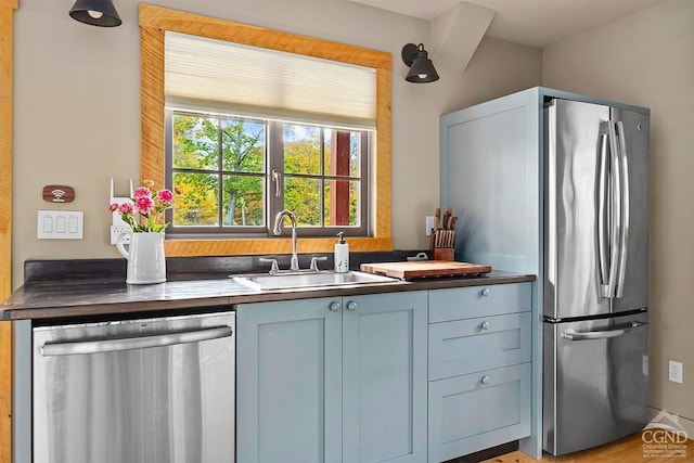 214 Fog Hill Rd, Austerlitz, NY 12017 - kitchen with appliances with stainless steel finishes, a sink, and dark countertops
