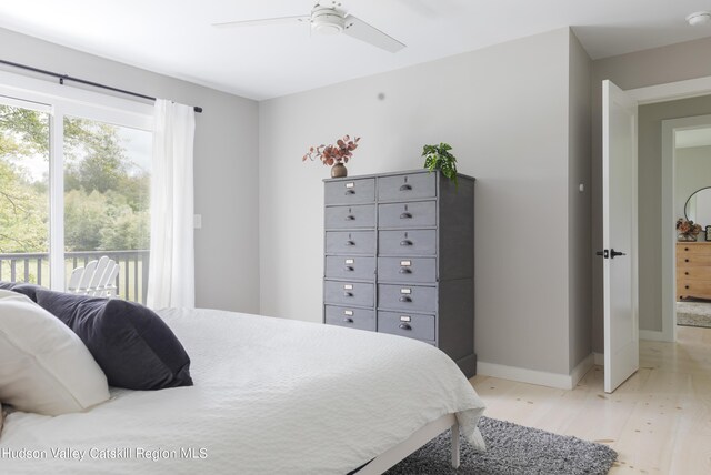 bedroom featuring ceiling fan, access to outside, and light hardwood / wood-style flooring