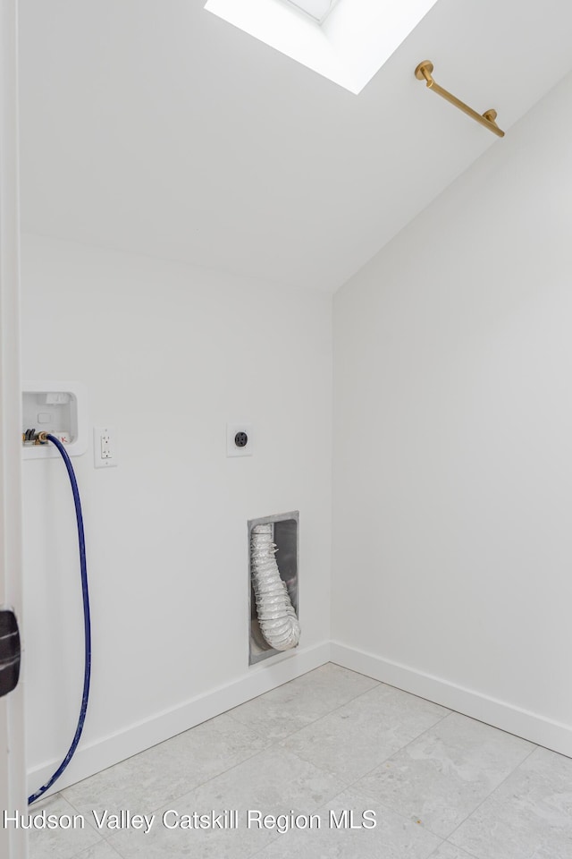 laundry room featuring hookup for an electric dryer, washer hookup, and a skylight