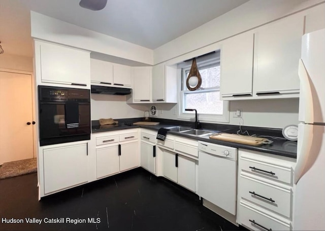 kitchen featuring white cabinets, sink, and black appliances