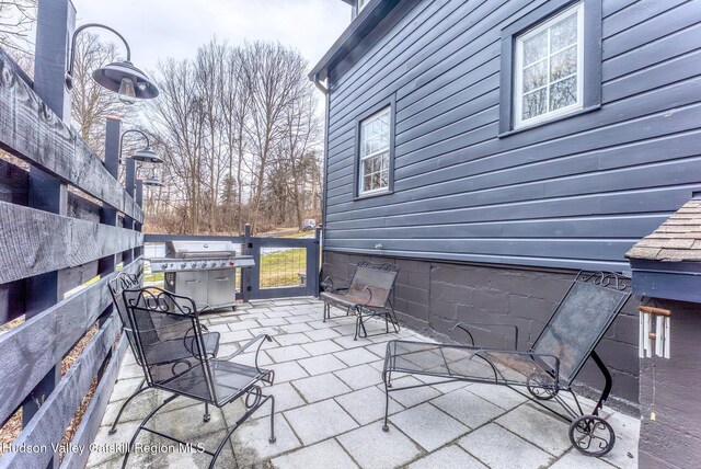 view of patio with a grill