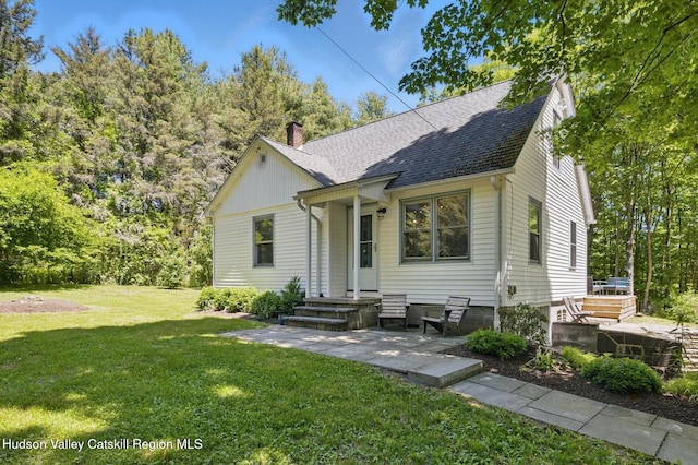 766 County Route 2, Accord, NY 12404 - view of front of home featuring a chimney, a front yard, and a shingled roof
