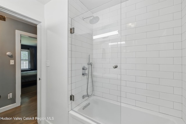 766 County Route 2, Accord, NY 12404 - bathroom with wood finished floors, baseboards, and shower / tub combination
