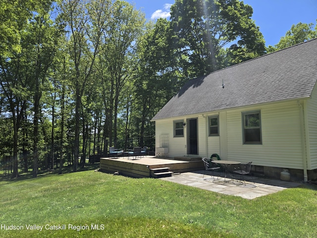 766 County Route 2, Accord, NY 12404 - rear view of property with a shingled roof, a yard, a wooden deck, and a patio