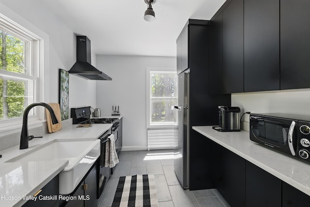 766 County Route 2, Accord, NY 12404 - kitchen featuring dark cabinets, wall chimney exhaust hood, black appliances, and a sink