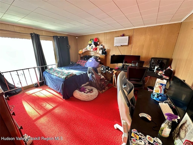 bedroom featuring wooden walls