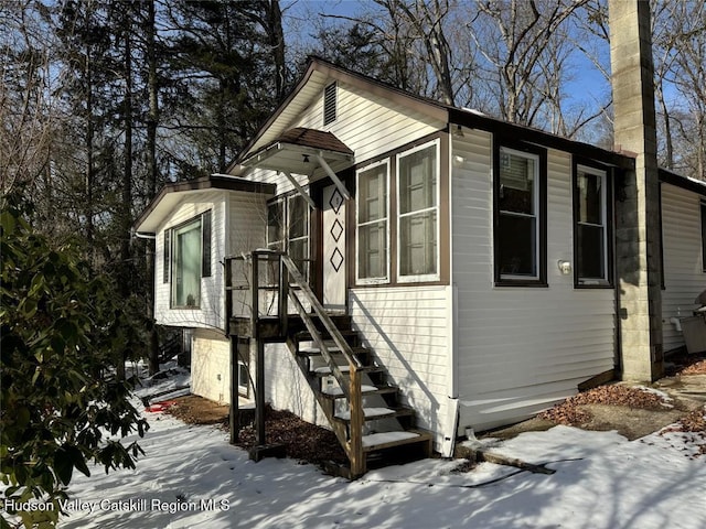 view of snow covered property