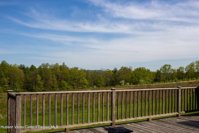 23 Raccoon Forks Rd, Old Chatham, NY 12136 - wooden deck with a forest view and a yard