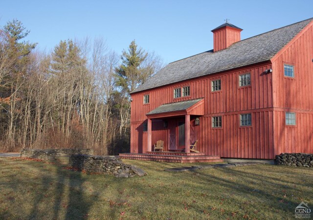 23 Raccoon Forks Rd, Old Chatham, NY 12136 - rear view of property featuring a lawn and a chimney