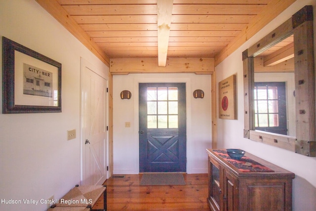 23 Raccoon Forks Rd, Old Chatham, NY 12136 - foyer entrance with wooden ceiling, wood finished floors, plenty of natural light, beam ceiling, and baseboards