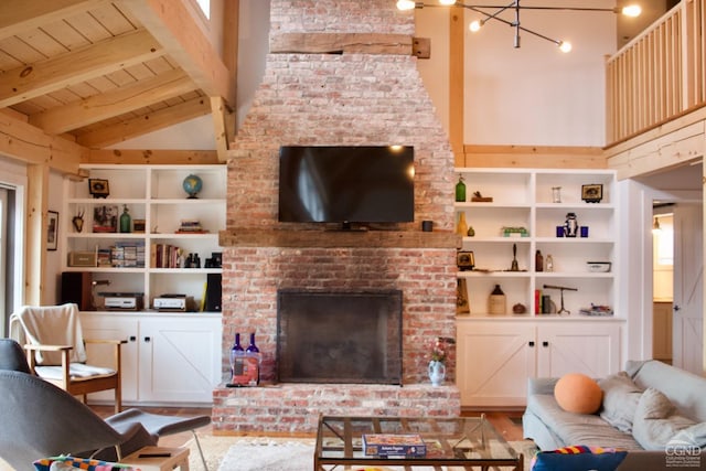 23 Raccoon Forks Rd, Old Chatham, NY 12136 - living room with wood ceiling, beamed ceiling, wood finished floors, high vaulted ceiling, and a brick fireplace