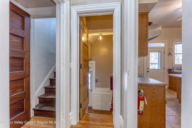 hallway featuring light tile patterned flooring