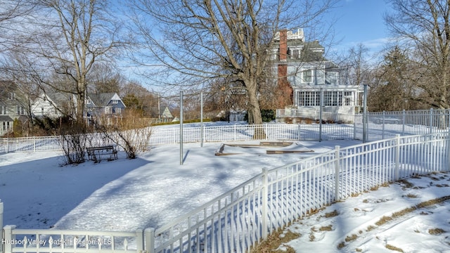 view of yard covered in snow